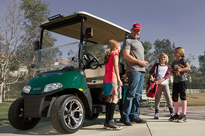 EZGO_Freedom RXV 2x2_Lifestyle Image_Family Sports_Green_2.jpg